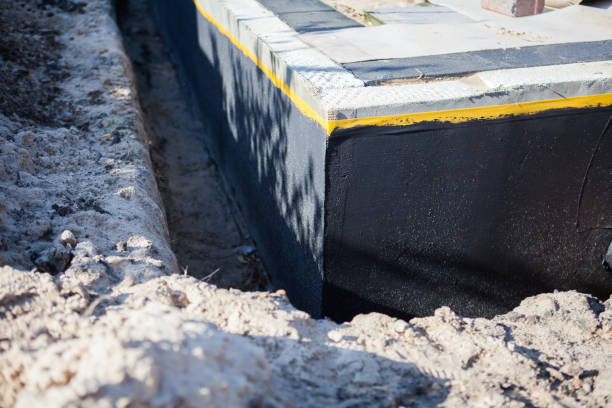 Professional Exterior Waterproofing technician working in Rahway, NJ